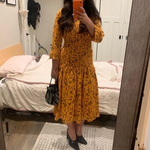 Gold and black floral drop waist dress